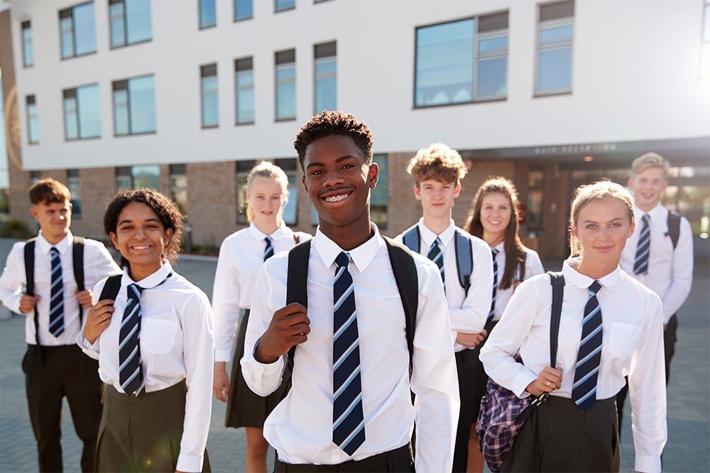 Pupils in uniform in front of their Independent school
